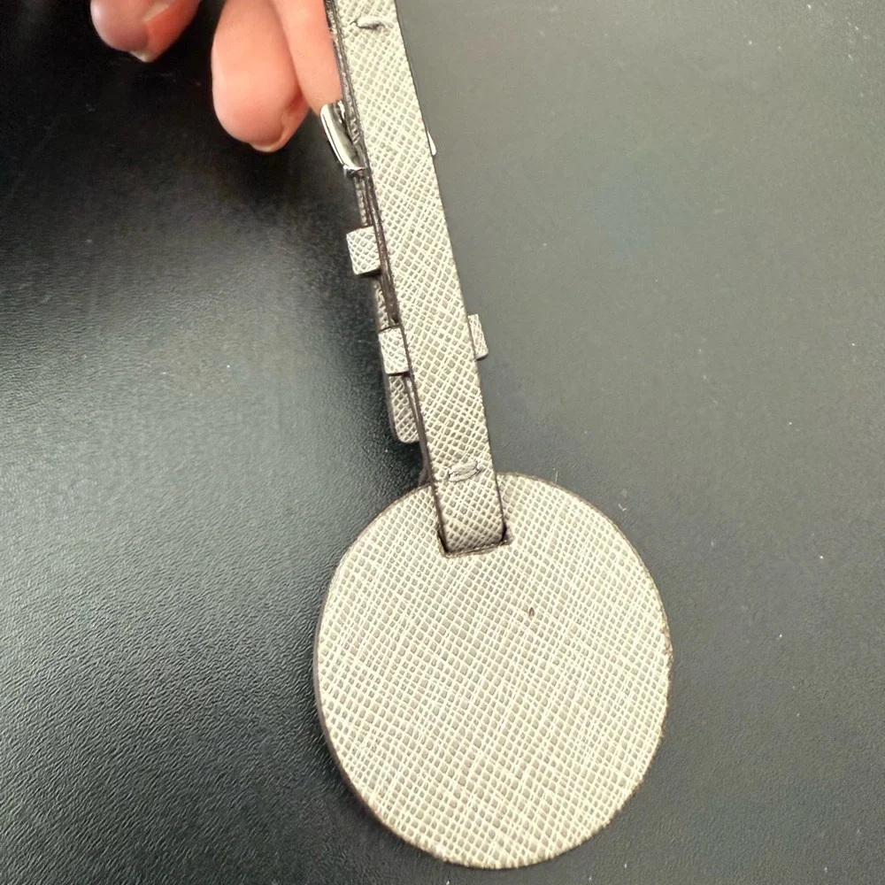 Michael Kors Silver MK Circle Logo Tag with Taupe Textured Strap